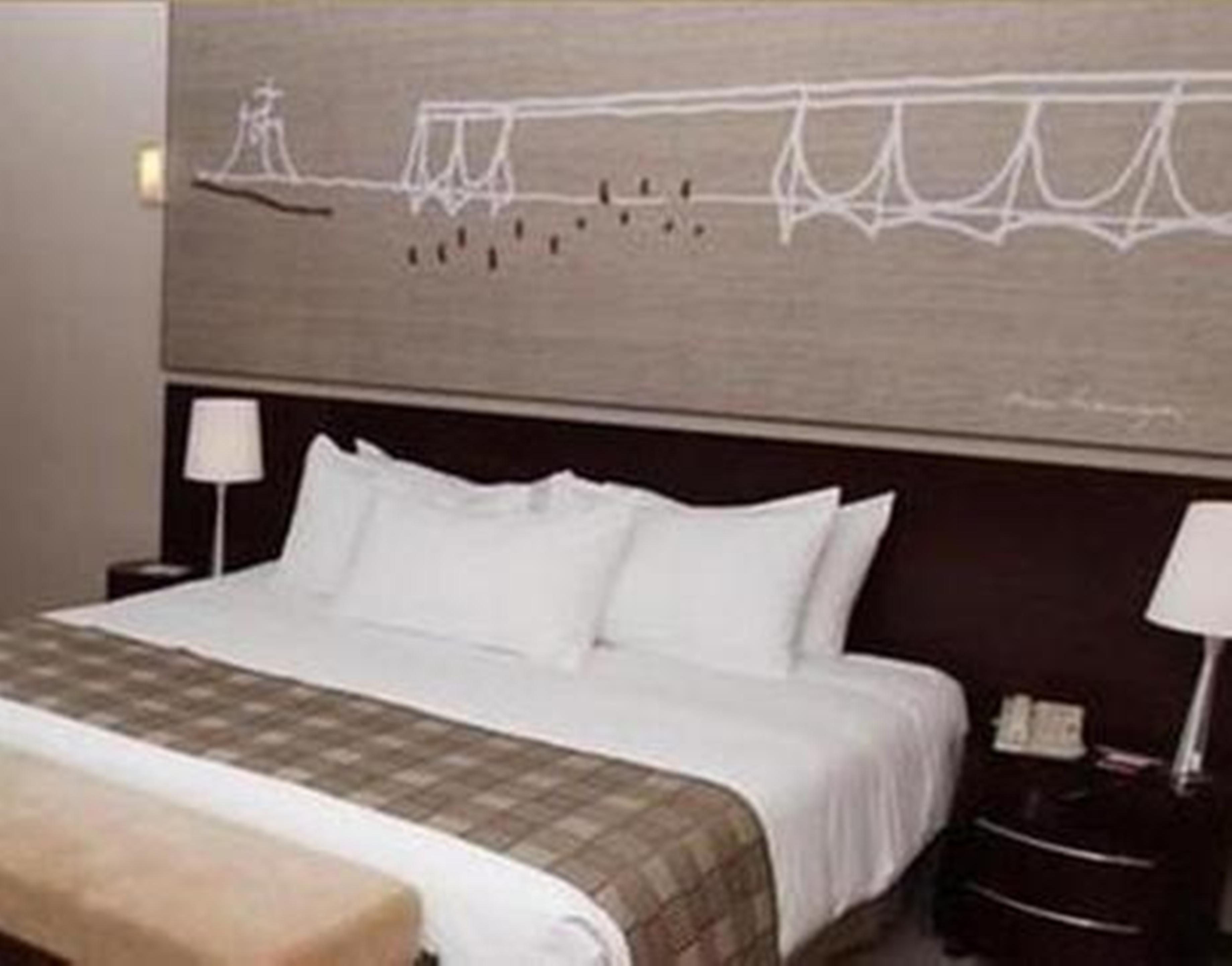Hotel Royal Tulip Brasilia Alvorada Exterior foto A bedroom at the hotel