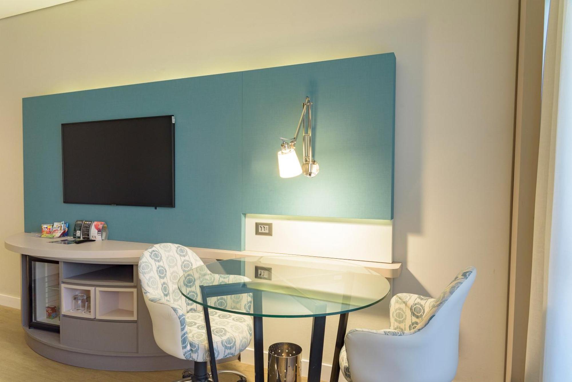 Hotel Royal Tulip Brasilia Alvorada Zimmer foto A wall-mounted light